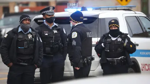 Getty Images Chicago police on scene of shooting in Park Manor