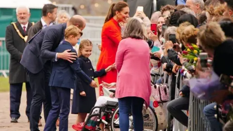 PA Media The Duke and Duchess of Cambridge with Prince George and Princess Charlotte, met Cardiff resident Siobhan Lewis