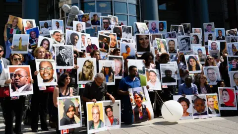 The Washington Post / Getty Images The families of the victims of the Ethiopian Airlines crash holding a vigil in front of the US Department of Transportation headquarters in Washington, DC in September 2019