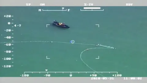 Police footage Police helicopter footage shows the white rope connecting the sacks