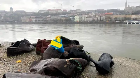 Shoes beside the Danube