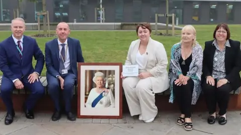 NLC Cllr Tim Mitchell, Cllr Rob Waltham, Holly-Mumby-Croft MP, Cllr Elaine Marper and Cllr Julie Reed with the plaque