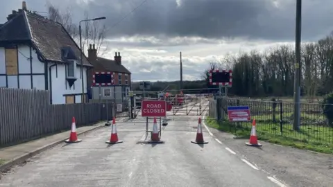 Network Rail Road closed at a level crossing