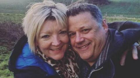 Michael Holmes, 57, and his wife Teresa 