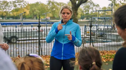 Christian Banfield Dr Bella Smith with some young athletes