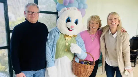 Government of Jersey The Minister for Children and Families, Constable Richard Vibert, with Fi Cisneros from Children’s Social Care (second from right) and Sarah Wakeham from Fostering and Adoption (far right).