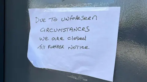 BBC Note on the door of a closed pub
