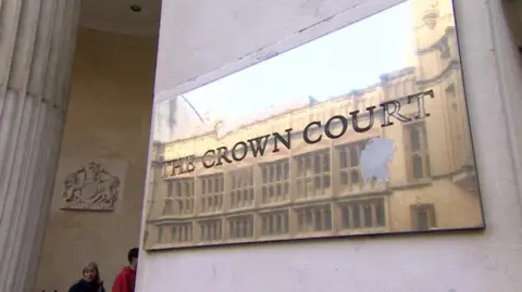 The plaque outside Bristol Crown Court