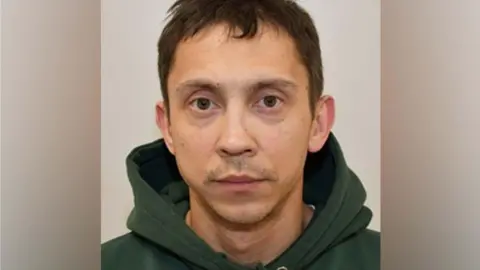 Undated handout photo issued by the Counter Terrorism Policing of Petro Pochynok, 35, who is charged alongside Roman Lavrynovych, 22, and Stanislav Carpiuc, 27, over a series of fires in north London last spring.