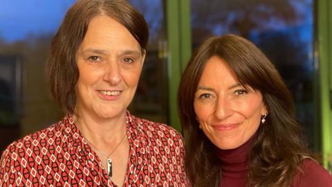 Liz Deutsch and Davina McCall standing next to each other and smiling