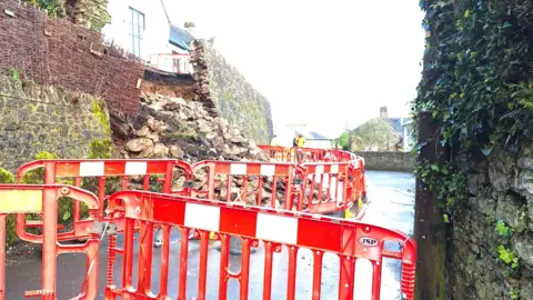 Richard Bond Cordon at a collapsed wall in Dittisham