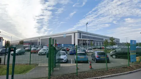 Google A Google image of a large white building which is the Co-op distribution centre in Pinxton, Derbyshire