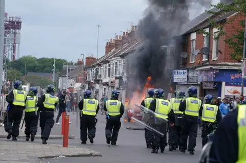 PA Riot police in Middlesbrough on Sunday