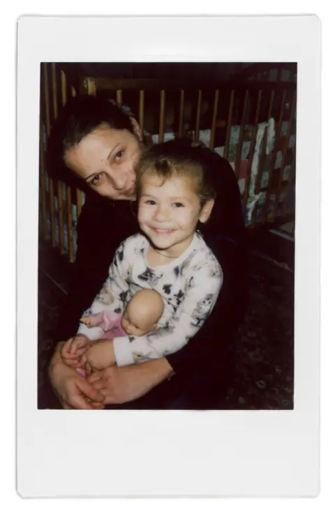 Jadwiga Bronte A polaroid photo of Ana and her daughter