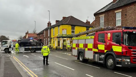 Car that crashed into house on Currie Road in Newark taken away