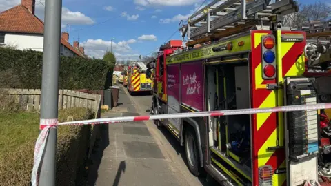 Nottinghamshire Fire and Rescue Service Fire engine and cordon 