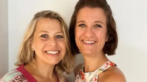 Emma Ziff Emma Ziff and Juliette smiling at the camera