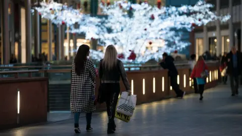 Getty Images Christmas shoppers