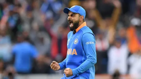 Getty Images Virat Kohli roars in the India v Pakistan game at Old Trafford