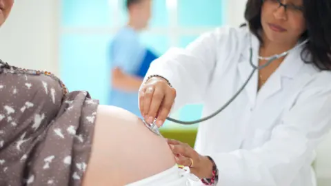 Getty Images Doctor in maternity unit