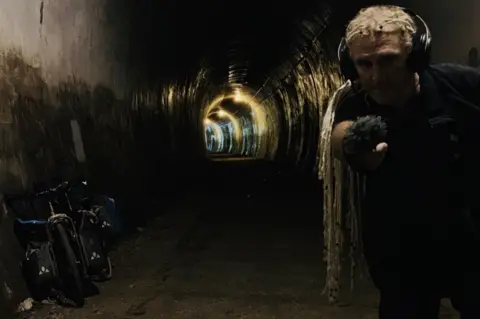 Paul Cheese Paul records in a tunnel