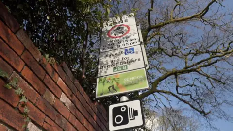 A sign displaying school street rules are in force