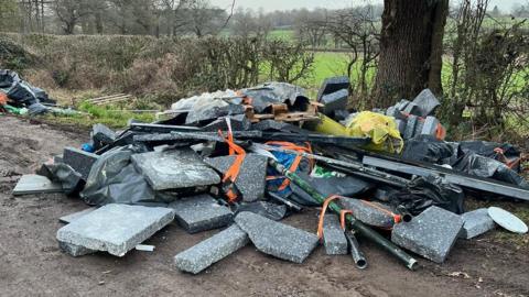 A heap of rubbish that has been fly-tipped