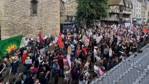 Protesters march through Oxford.