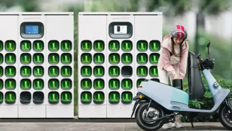 Gogoro The owner of a Gogoro motorbike changing its battery