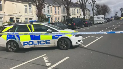 BBC Police car at a cordon