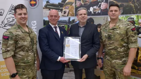 Wolverhampton City Council Councillor Greg Brackenridge Councillor Jonathan Crofts,Lieutenant Dominic Mika and Colour Sargent Louis Wytcherley