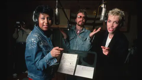 Getty Images Aretha Franklin with Dave Stewart and Annie Lennox in 1985