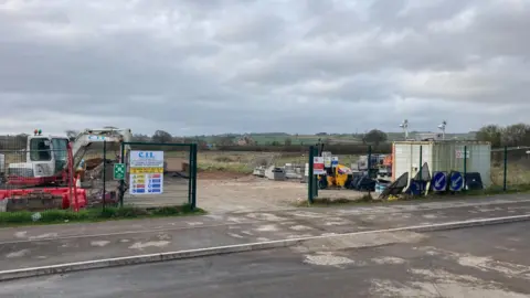 Daniel Mumby Picture of a digger and building materials at the proposed site of new Wilstock Primary School on Cosmos Drive in Bridgwater