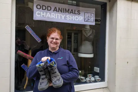 BBC Heather Leonard outside the shop