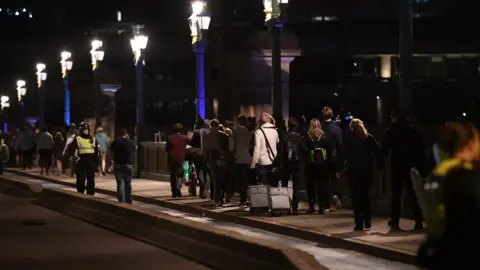 Getty Images Police led people to safety after the attack