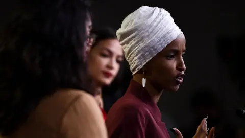 AFP Representatives Ilhan Omar speaks at a press conference with her three Democratic colleagues