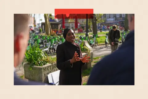 Getty Images Kemi Badenoch speaks as she visits Clapham High Street 