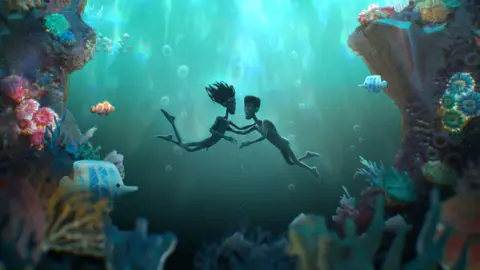 One6th Animation/Number Nine PR A still shot from the short film showing an animated image of two boys swimming underwater next to colourful coral and tropical fish.