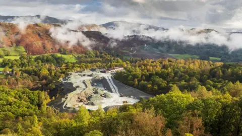 A picturesque view of Elterwater Quarry with clouds