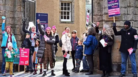 Getty Images Members of the University and College Union (UCU) picket outside a University of Edinburgh campus