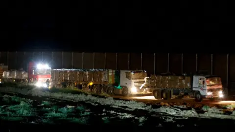 Reuters Aid lorries wait on the border with Gaza