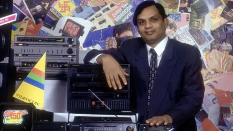 Getty Images Dhoot seen with products from Videocon