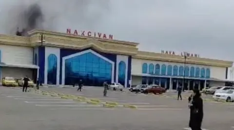 Social Media Smoke rises following a drone explosion at the airport of Nakhchivan, Azerbaijan, in this screengrab obtained from a social media video released March 5, 2026