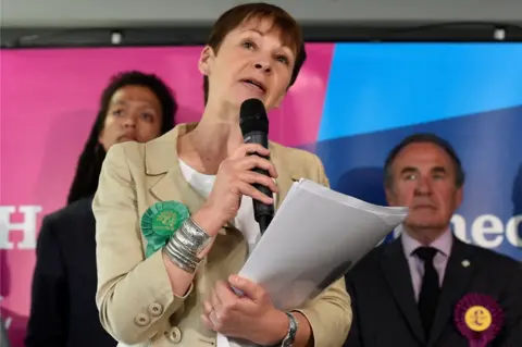 Adam Holt/REUTERS/ Caroline Lucas, co-leader of the Green Party, speaks after retaining her seat in the general election, in Brighton, June 9, 2017.