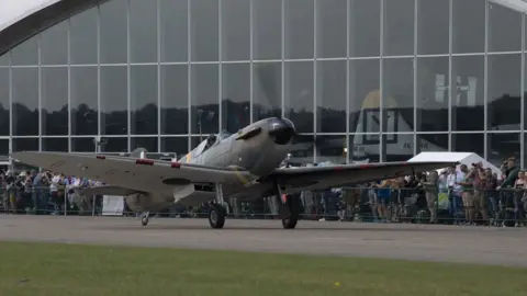 IWM Duxford Spitfire on runway at Duxford Museum