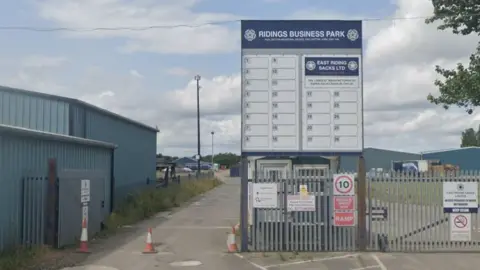 Google Entrance to East Riding Sacks factory with sign