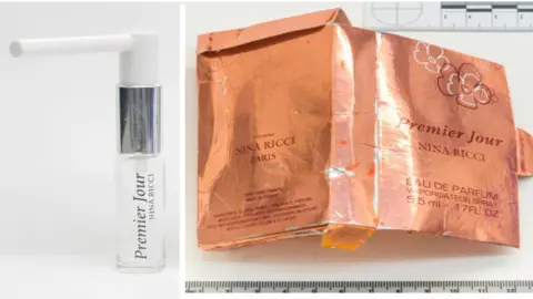 Reuters On the left there is a cylindrical clear perfume bottle with a long white nozzle. On the right there is rose gold packaging from the same counterfeit perfume bottle.