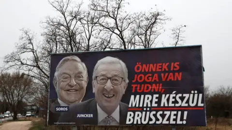 Reuters A government billboard is seen in Budapest, Hungary, March 13, 2019. The billboard reads, "You also have the right to know what Brussels is up to",