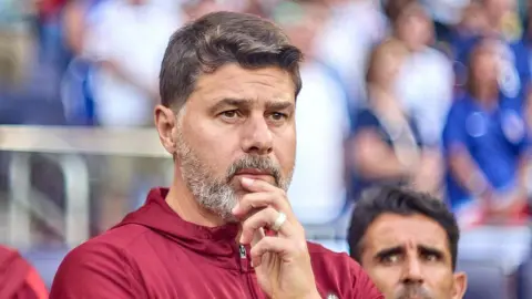 United States head coach Mauricio Pochettino looking on with his hand on his chin