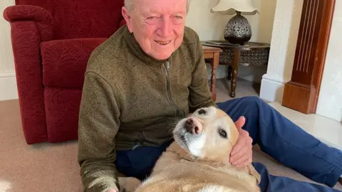 Michael Chequer/BBC David Gailey and Tarka